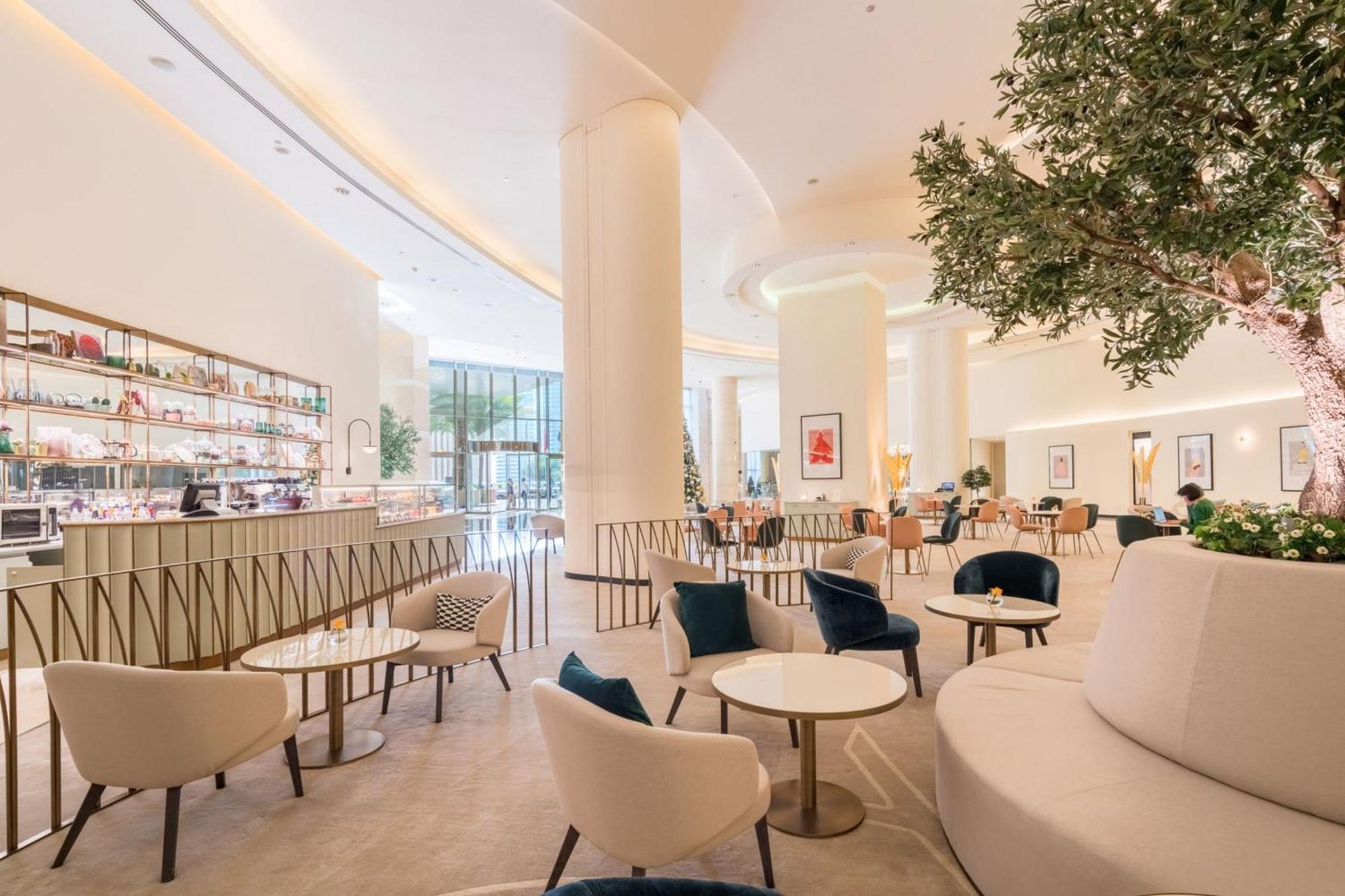 Jw Marriott Hotel Marina Dubai Exterior photo The Café at The Ivy Collection